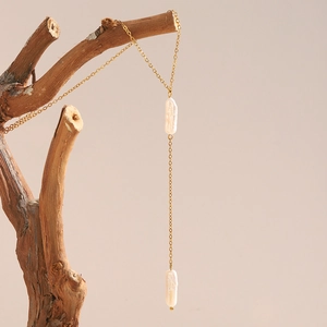 Minimalist 18K gold plated stainless steel necklace with long baroque pearl tassels