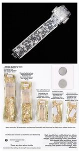 Detail showing 5cm width golden and silver LED ribbon lights with diverse battery options
