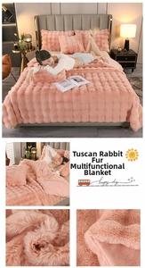 Close-up of pink faux rabbit fur blanket with embossed checkered texture and matching pillow