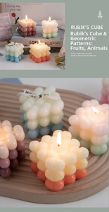 Macro shot showing multi-layer gradient colors and bubble texture of the cube candle