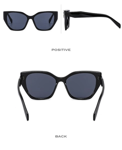 Front and back views of classic black cat-eye sunglasses with thick frames and dark lenses