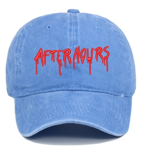 Detailed close-up of the red AFTER HOURS 3D embroidery on a blue cotton baseball cap