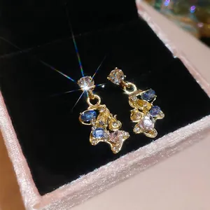 Colorful rhinestone bear drop earrings in gold plating displayed in a premium velvet gift box