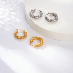 Retro C-shape geometric hoop earrings with molten lava texture in gold and silver finish