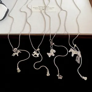 Luxurious horse pendant necklaces with zircon inlay and sleek snake chains for women
