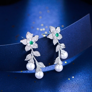 Elegant silver flower drop earrings with green zircon, leaf accents and white pearls