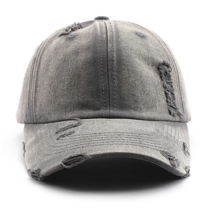 Retro distressed gray washed cotton baseball cap with torn details and curved brim