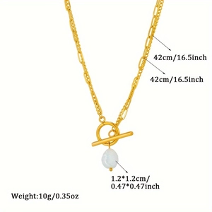 Detail of gold double-layer chain necklace with toggle clasp and baroque pearl pendant