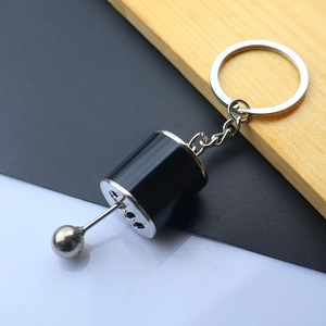 Detail of creative manual gearbox shifter keychain with movable 6-speed lever gear