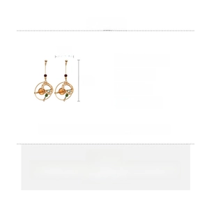 Detail shot of vintage crystal drop earrings with size specs and material info