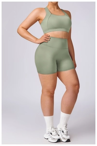 Sage green plus size sports set with high waist compression shorts and active bra