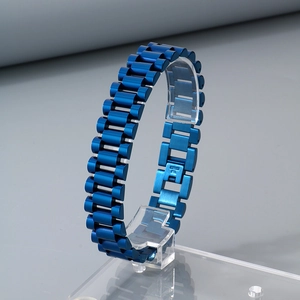 Detailed side view of a 15mm blue stainless steel watch-style chain bracelet