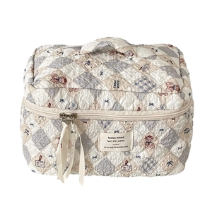 Quilted teddy bear makeup bag in blue and beige checkered pattern with sturdy handle