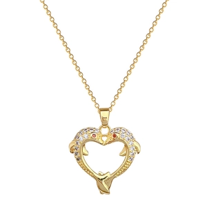 Luxurious gold heart dolphin necklace with sparkling crystals on white background