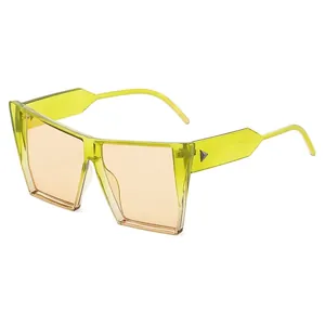 Fashionable fluorescent green oversized cat-eye sunglasses with triangle metal rivets