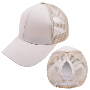Detail of breathable mesh back and ponytail hole on beige baseball cap