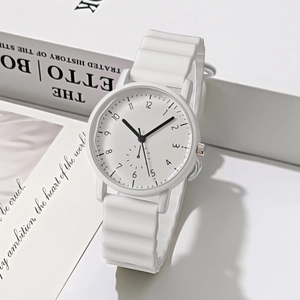 Detail of white quartz watch featuring a unique wavy silicone strap and minimalist dial