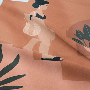 Close-up of thick woven fabric texture with artistic bohemian female figure print