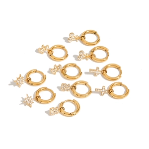 Golden stainless steel hoop earrings set with rhinestone star and cross pendants
