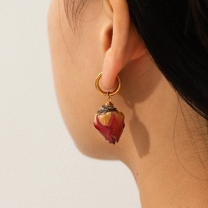Elegant gold stainless steel hoop earrings with dark red dried rose bud pendant for women