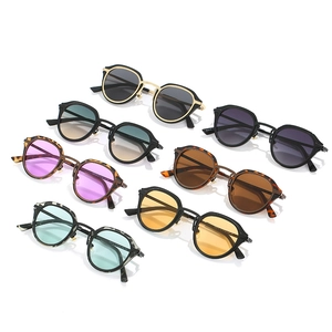 Variety of retro oval metal sunglasses in multiple lens colors and frame textures