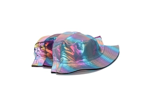 Close-up of three reflective iridescent bucket hats in pink, purple, and blue metallic fabric