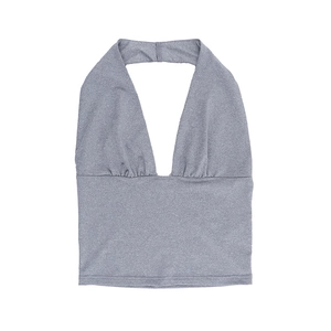 Detailed view of dark grey halter neck crop top made from stretch knit fabric