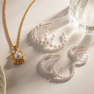 Gold-plated stainless steel jewelry set featuring C-shape pearl earrings and square necklace