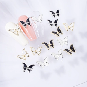 Breloques papillon 3D en alliage pour nail art avec finition émail noir et blanc pour DIY