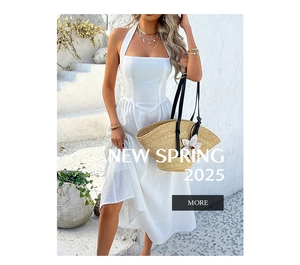 Detail of white halter neck maxi dress with textured fabric and structured waist design