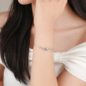 S925 sterling silver butterfly bracelet with yellow and blue cubic zirconia crystals