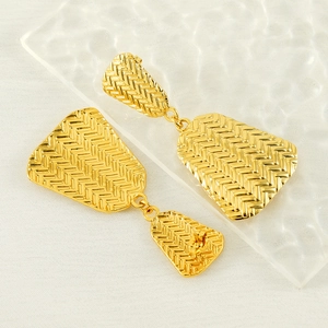 Exaggerated braided gold earrings for women with geometric trapezoid dangle design