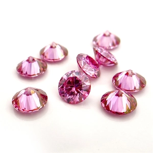 Macro shot of eight round brilliant cut pink moissanite stones with hearts and arrows