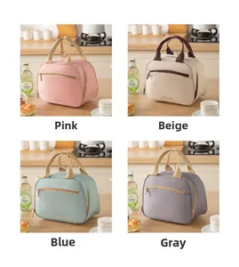 Portable insulated lunch bag set in pink, beige, blue, and grey with front zipper pocket