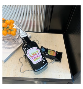 Creative black sauce bottle shaped handbag with chain strap and printed graphics