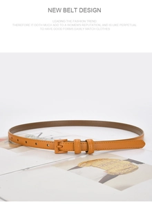 Slim mustard yellow leather belt for women displayed on a fashion magazine background