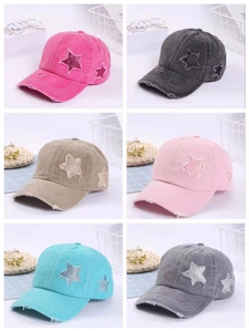 Detail showing vintage washed cotton baseball caps with sequined star patch in six colors
