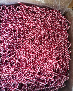 Bulk red and white acrylic Christmas candy canes decorations in a packaging box