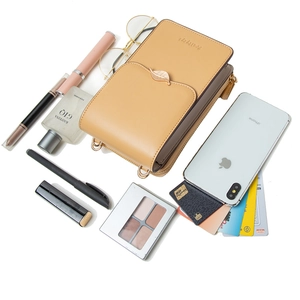 Yellow PU leather crossbody phone bag with leaf buckle and daily essentials layout
