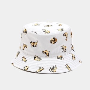 Detailed close-up of white bucket hat featuring cute hand-drawn calico cat patterns