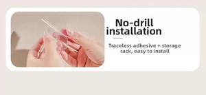 Detail showing adhesive hook installation for a wall-mounted paper towel dispenser box