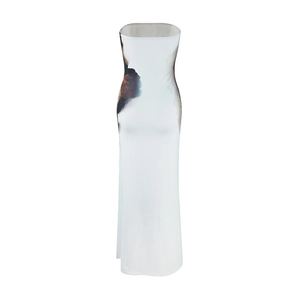 Detail view of white strapless tube maxi dress with dark marble ink patterns on sides