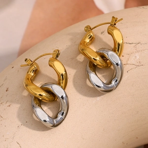 Two-tone interlocking twist hoop earrings in 18K gold and silver plated stainless steel