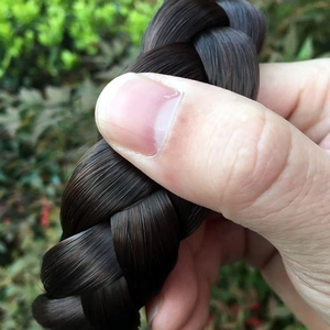 Wide thick braided headband in dark brown synthetic hair with a non-slip tooth design