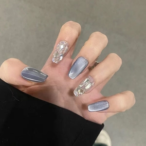 Gray cat-eye press-on nails with silver glitter and rhinestone long ballerina shape