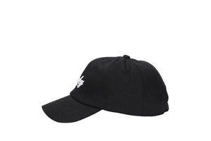 Detail of white 3D embroidery on the side of a black cotton sports baseball cap