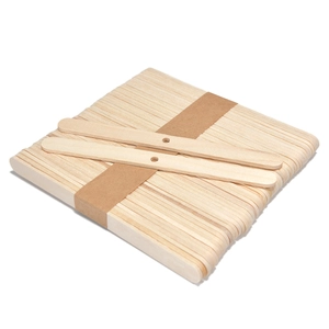 Close-up of natural flat wooden candle wicks with pre-drilled holes for DIY making