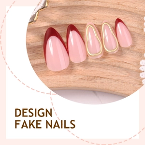 Luxurious almond-shaped press-on nails with deep red French tips and gold 3D embossed lines