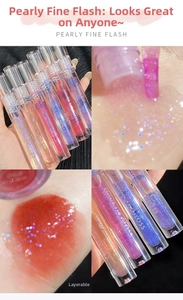Macro detail of shimmer lip gloss texture with glitter particles and arm swatches