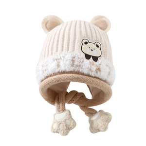 Winter knit baby bear earflap hat with warm plush fur trim and cute paw pom-poms